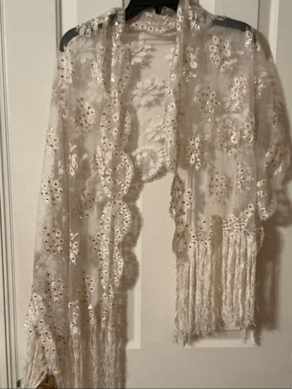 Lace shawl with gold accents